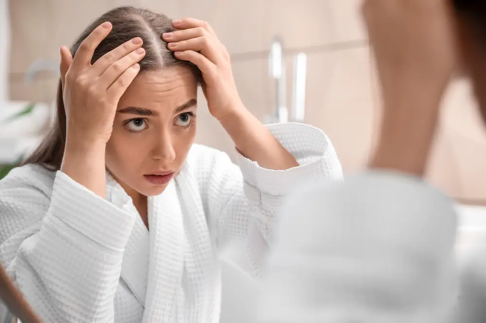 15 Lifestyle Habits Accidentally Causing Hair Loss & How to Stop the Shed